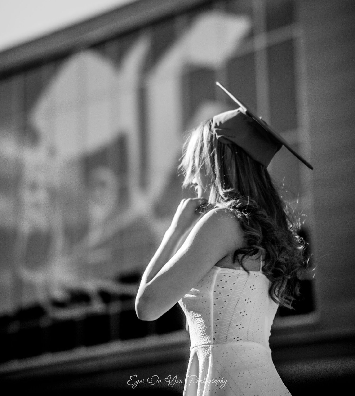 Black and white photo sequence of person in white dress from behind in dramatic lighting.