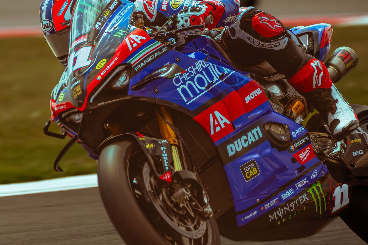 Rory Skinner competes at high speeds at Donington Park circuit.