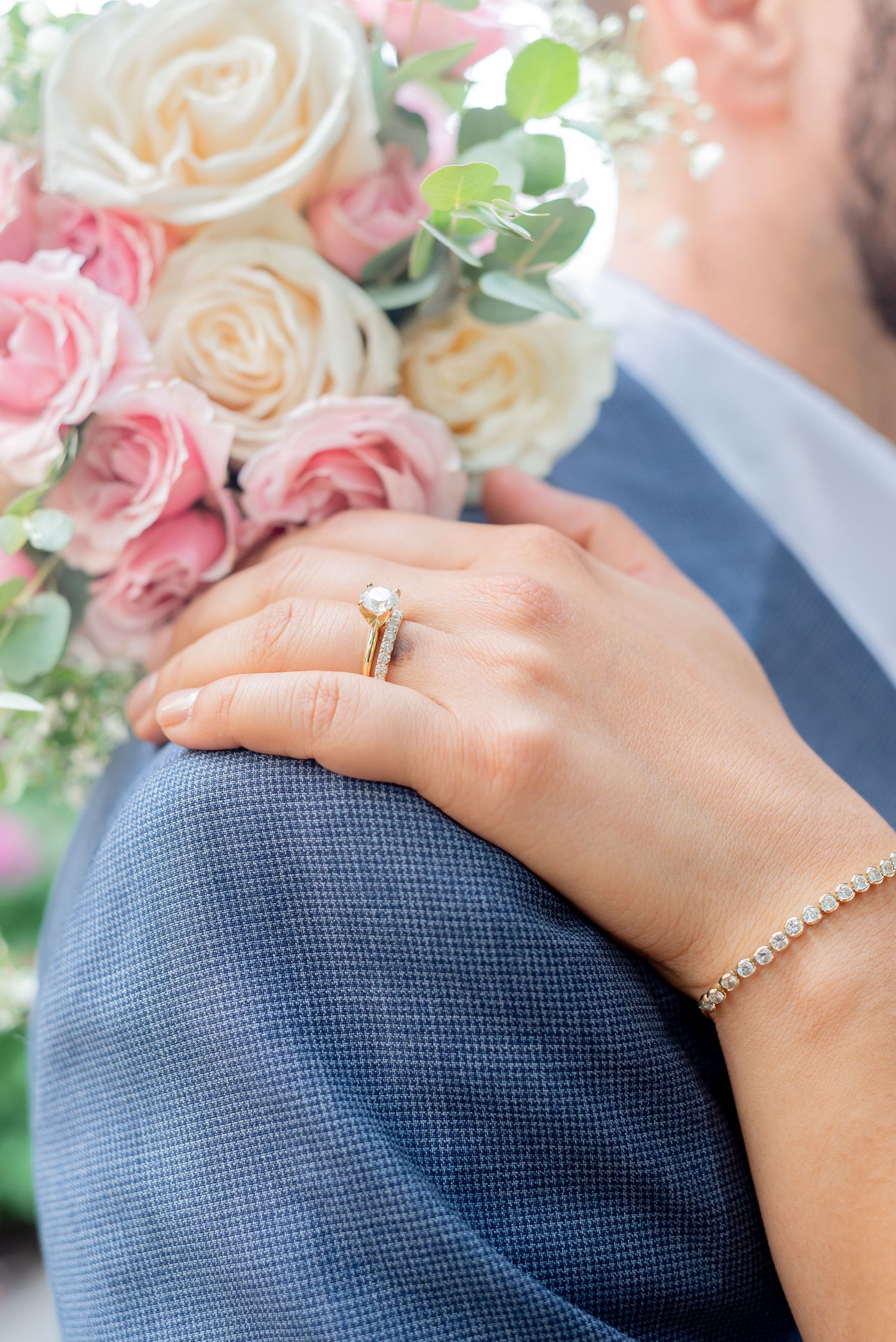 Beautiful couple after their elopement wedding in Charlotte NC. Bride wearing simple white dress while groom wears gorgeous blue suit.