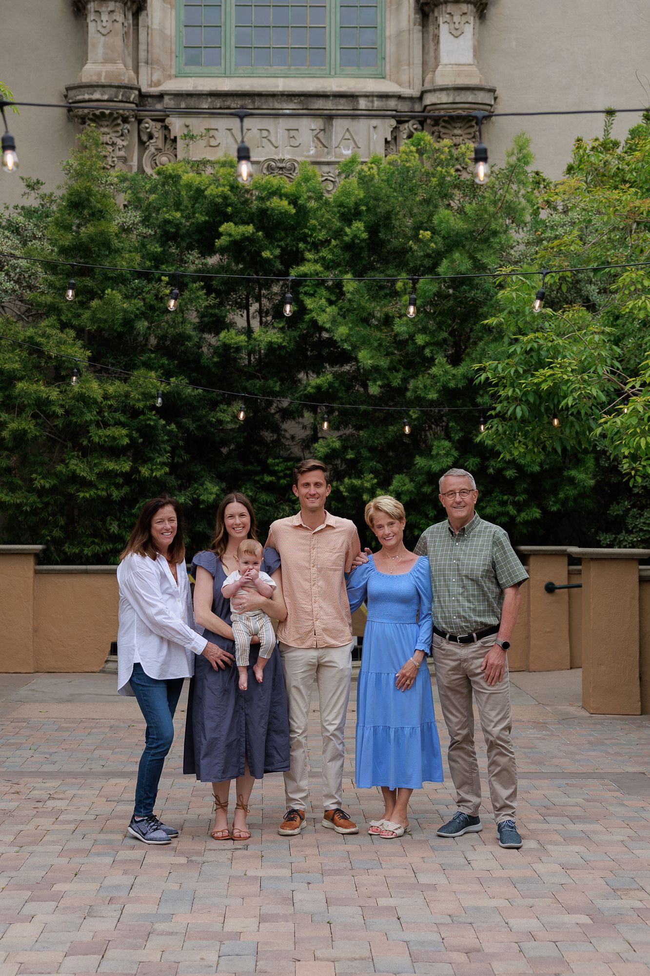 Extended family photo with toddlers