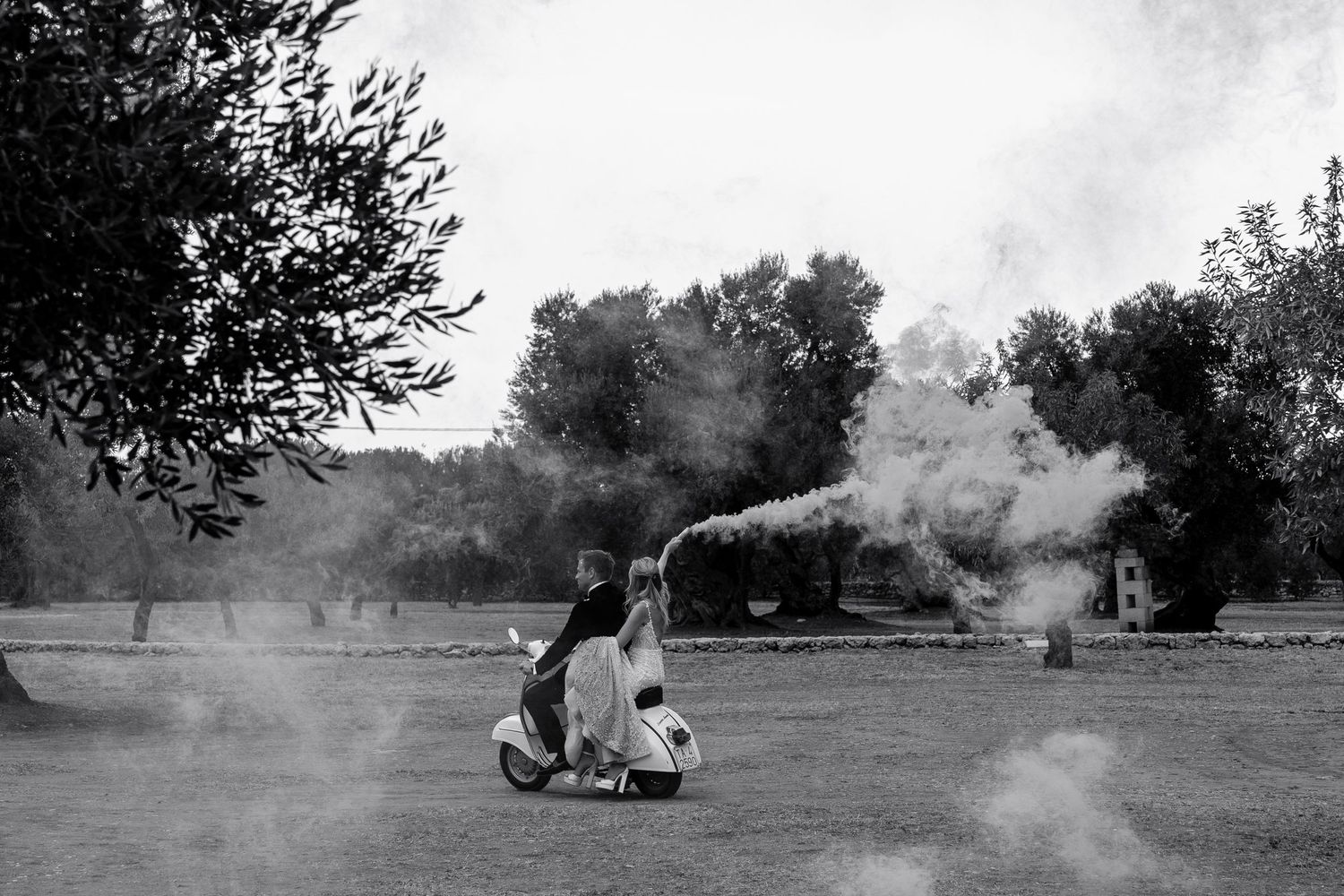 Black and white sequence of smoke effects creating atmosphere in an outdoor setting.
