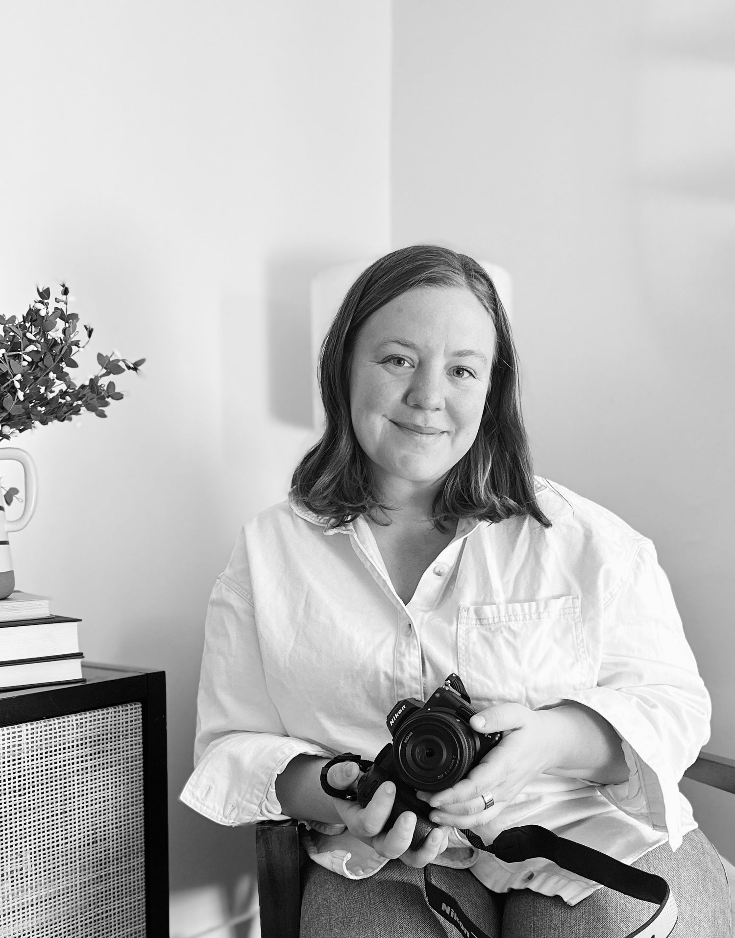 A series of black and white photos showing someone in a white shirt reclining on furniture in different poses.