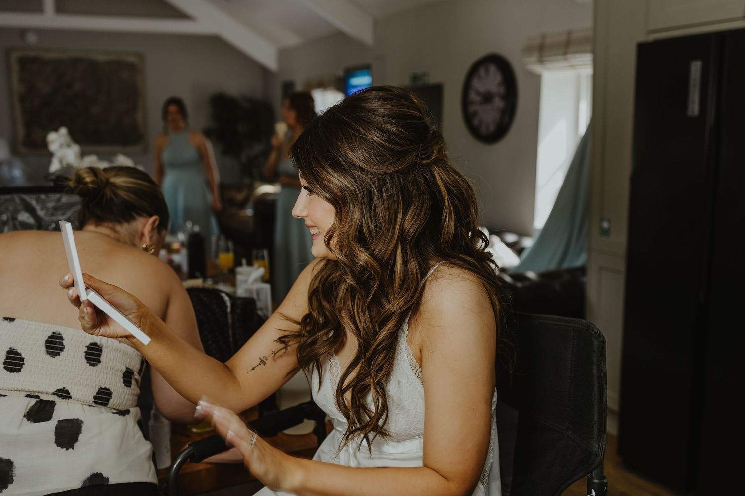Wedding morning preparation scene with styling tools.