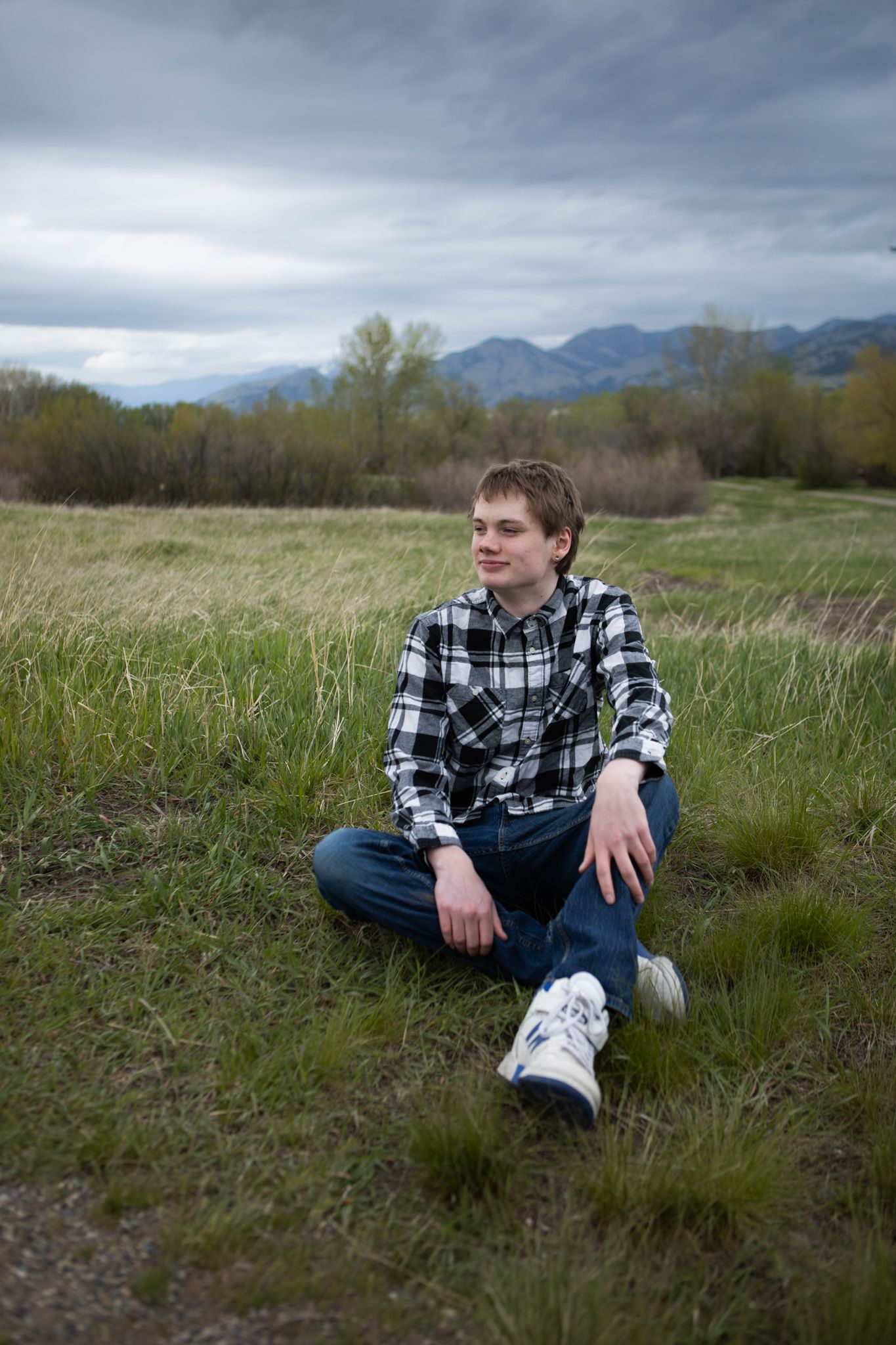 A Belgrade Senior sits in a field in Bozeman, Montana.