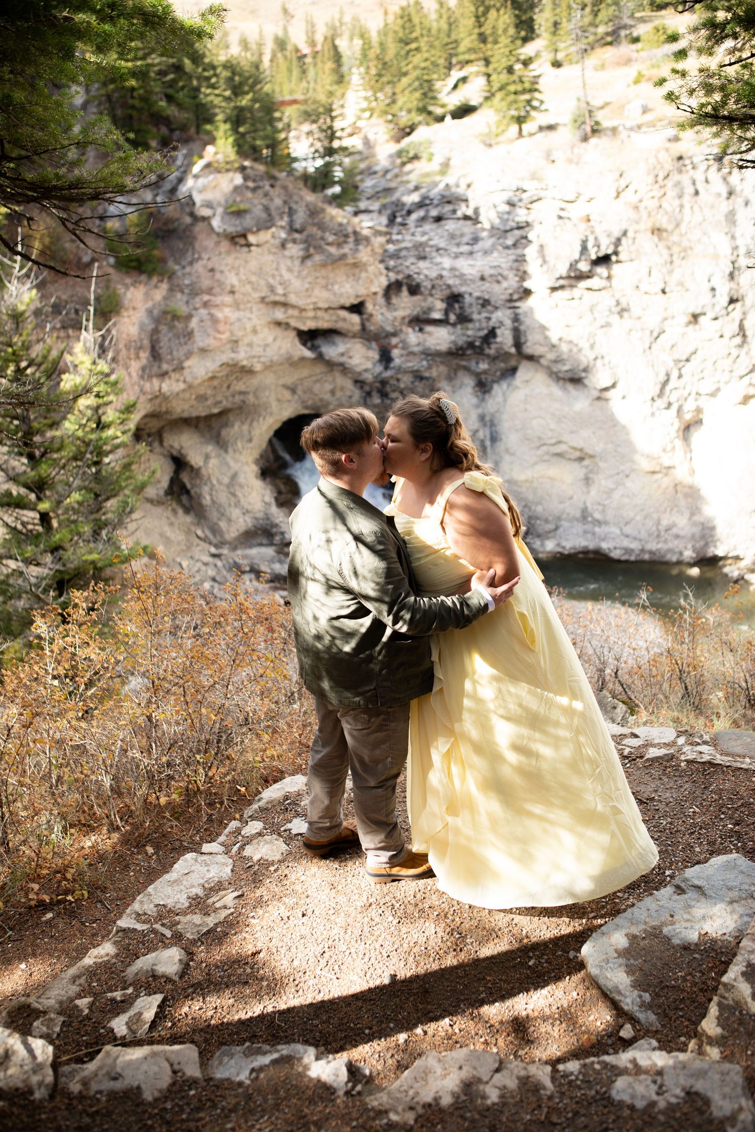 A newly engaged Montana Couple kissing in Montana.