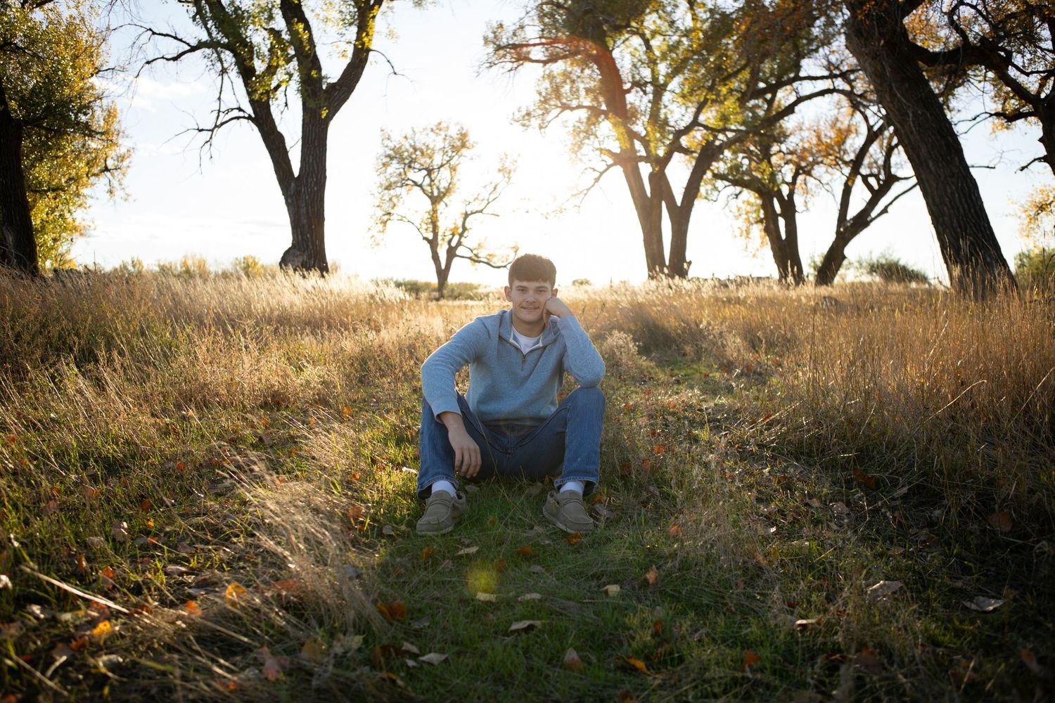 Bozeman, Montana Senior sitting in a field in Eastern Montana.