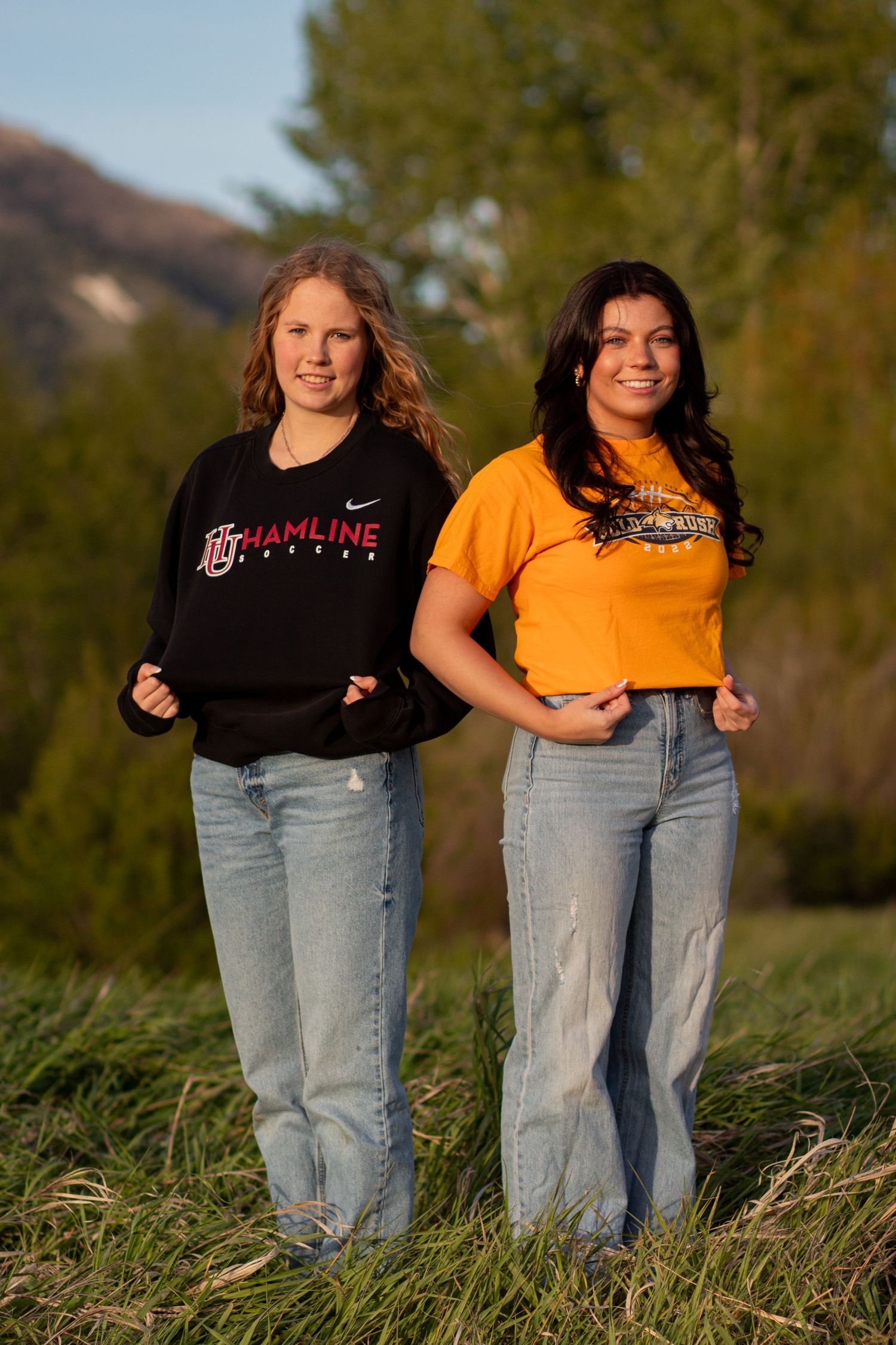 Two Bozeman Seniors pose in their college shirts in Bozeman, Montana.