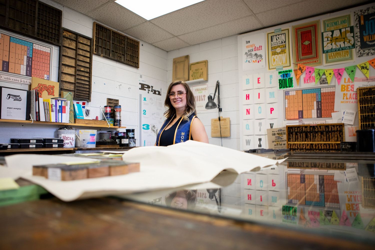 A Montana State University grad stands in the printmaking room in Haynes Hall in Bozeman, Montana.