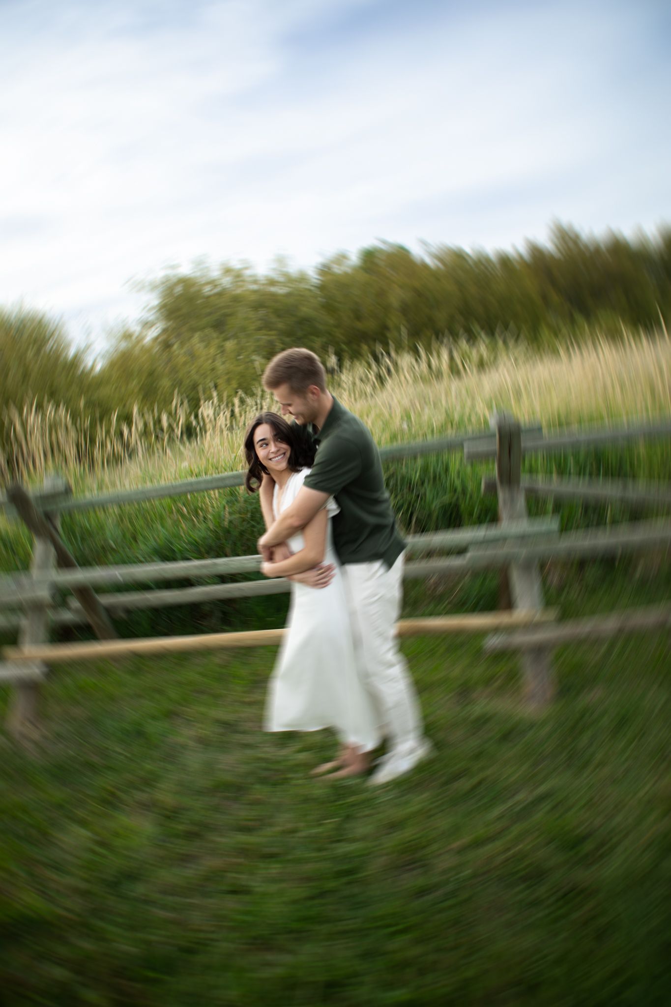 A newly engaged Montana Couple dance together in Bozeman, Montana.