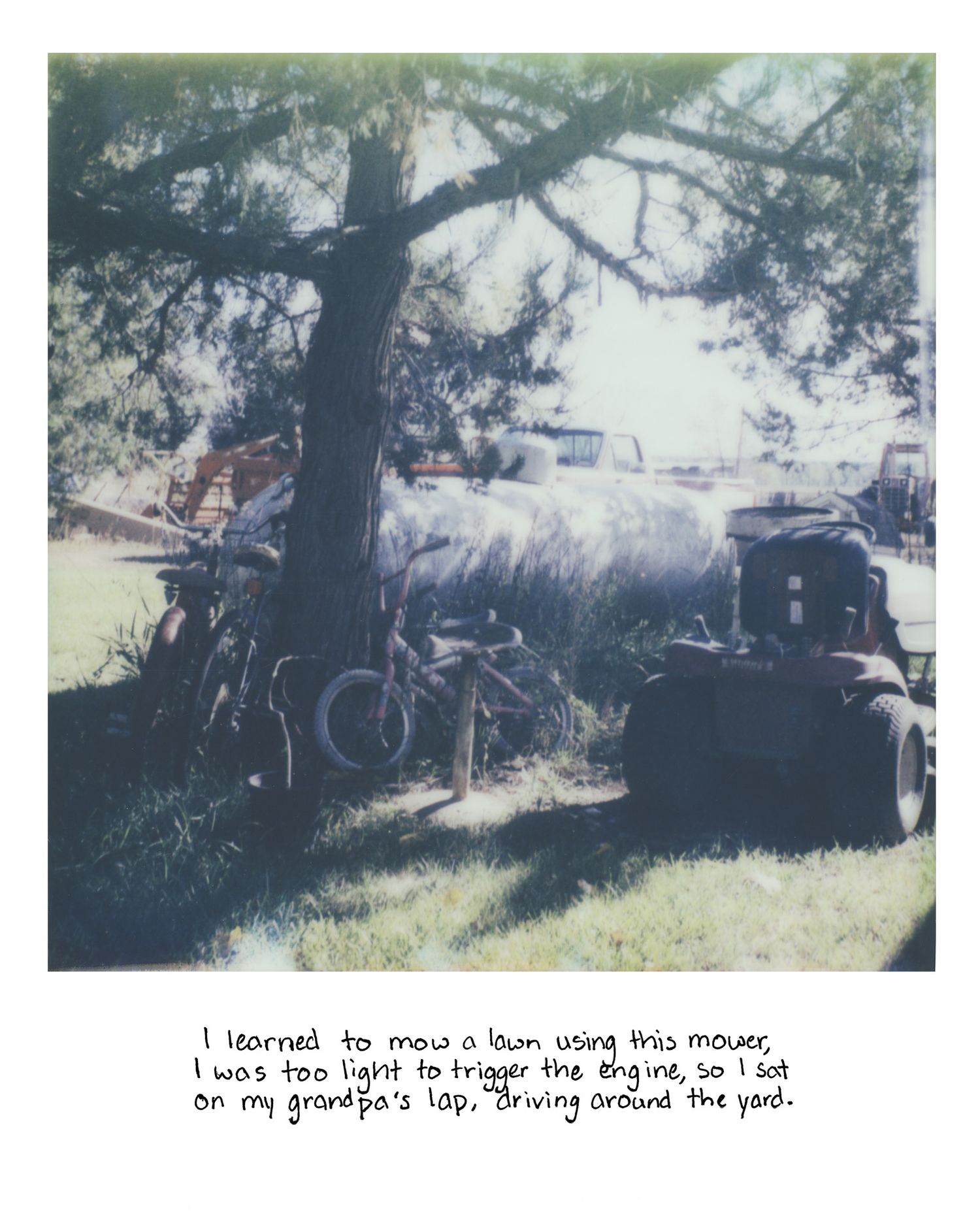 Sierrah Elizabeth Photography's senior exhibition project, a scanned polaroid image of bikes on the farm.