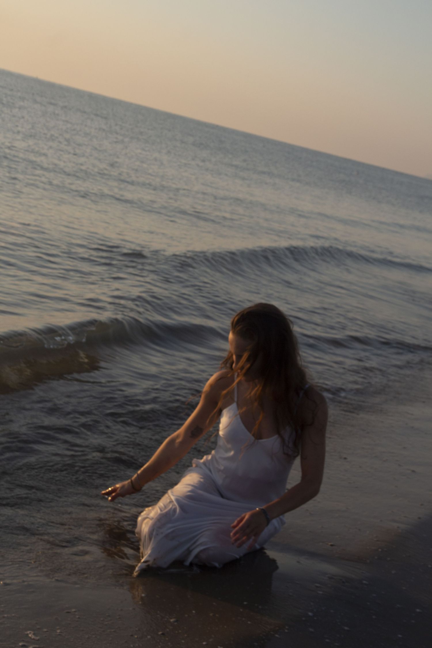 romantic woman photo session by the sea