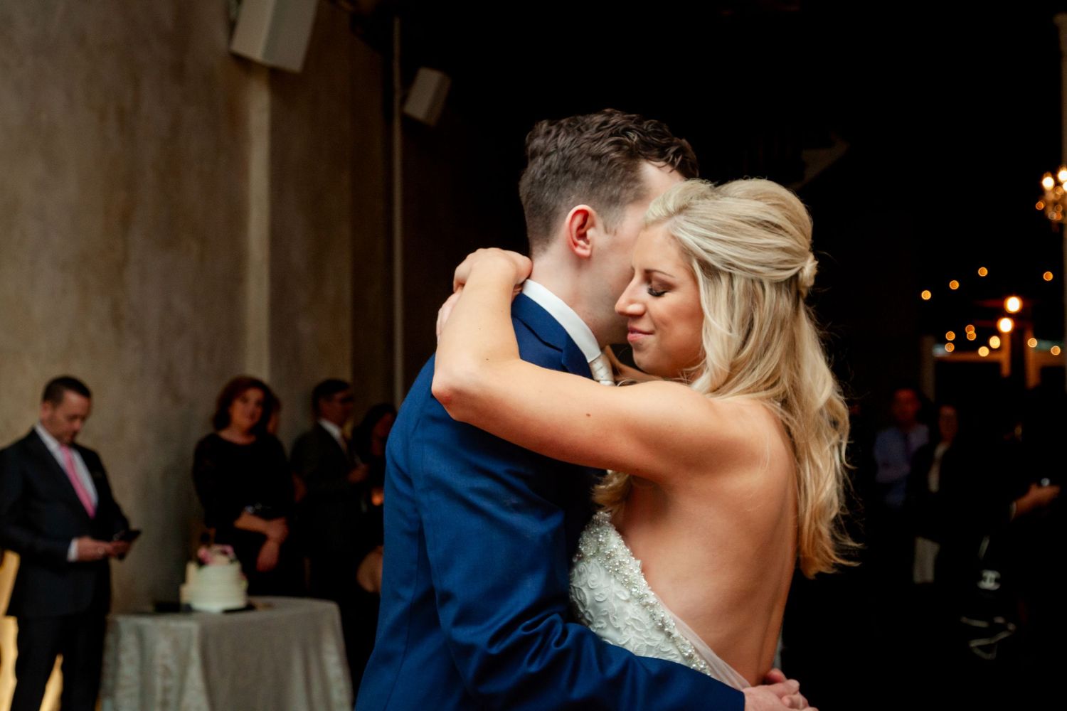 Couple sharing intimate dance moment at their wedding reception.