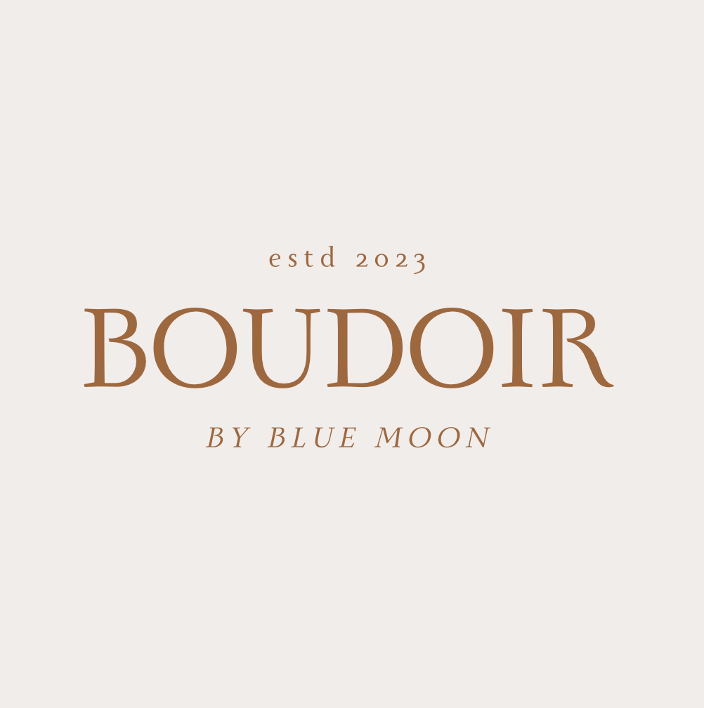 Stylish branding text 'BOUDOIR by BLUE MOON' on light neutral background.