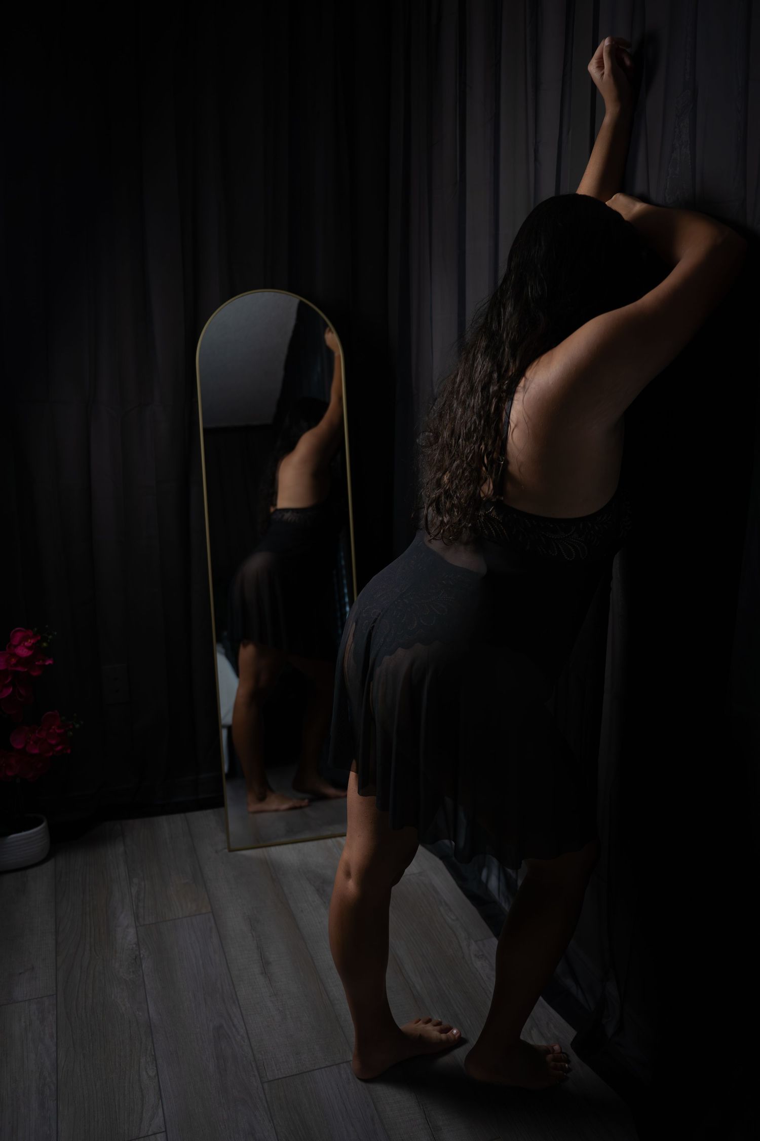 Moody low light photography series in black attire.