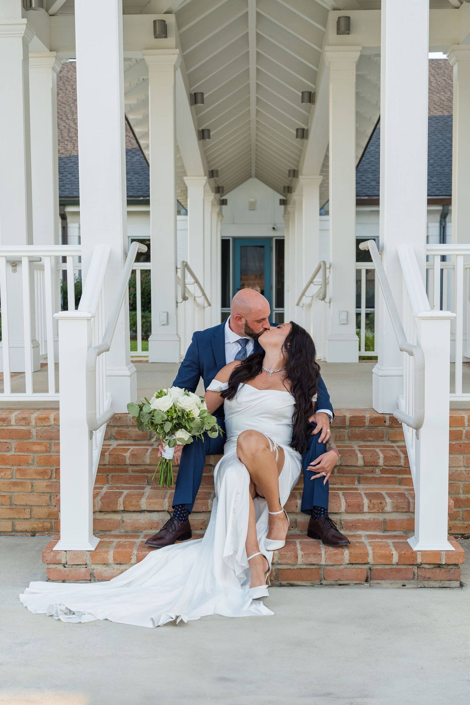 Romantic wedding photo sequence showing a couple sitting and kissing on brick steps framed by white columns.