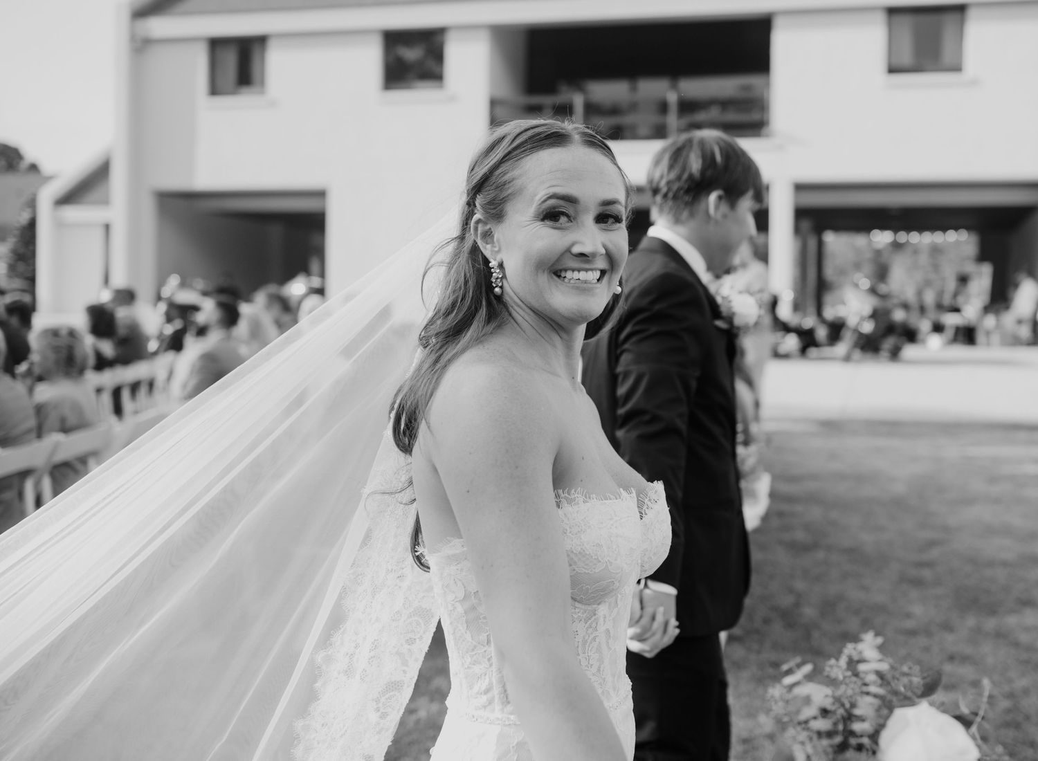 Wedding celebration captured in a series of joyful black and white photographs.