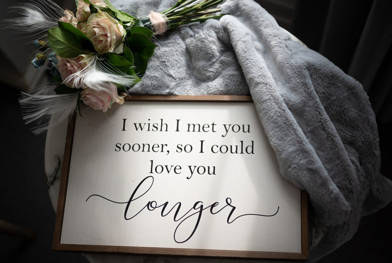 Elegant calligraphy text on white paper with romantic message and delicate floral elements.