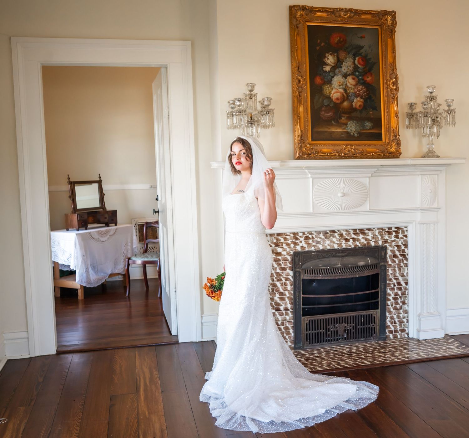 A wedding dress swishes gracefully across a room with ornate fireplaces and antique frames on the wall as part of a photo sequence.