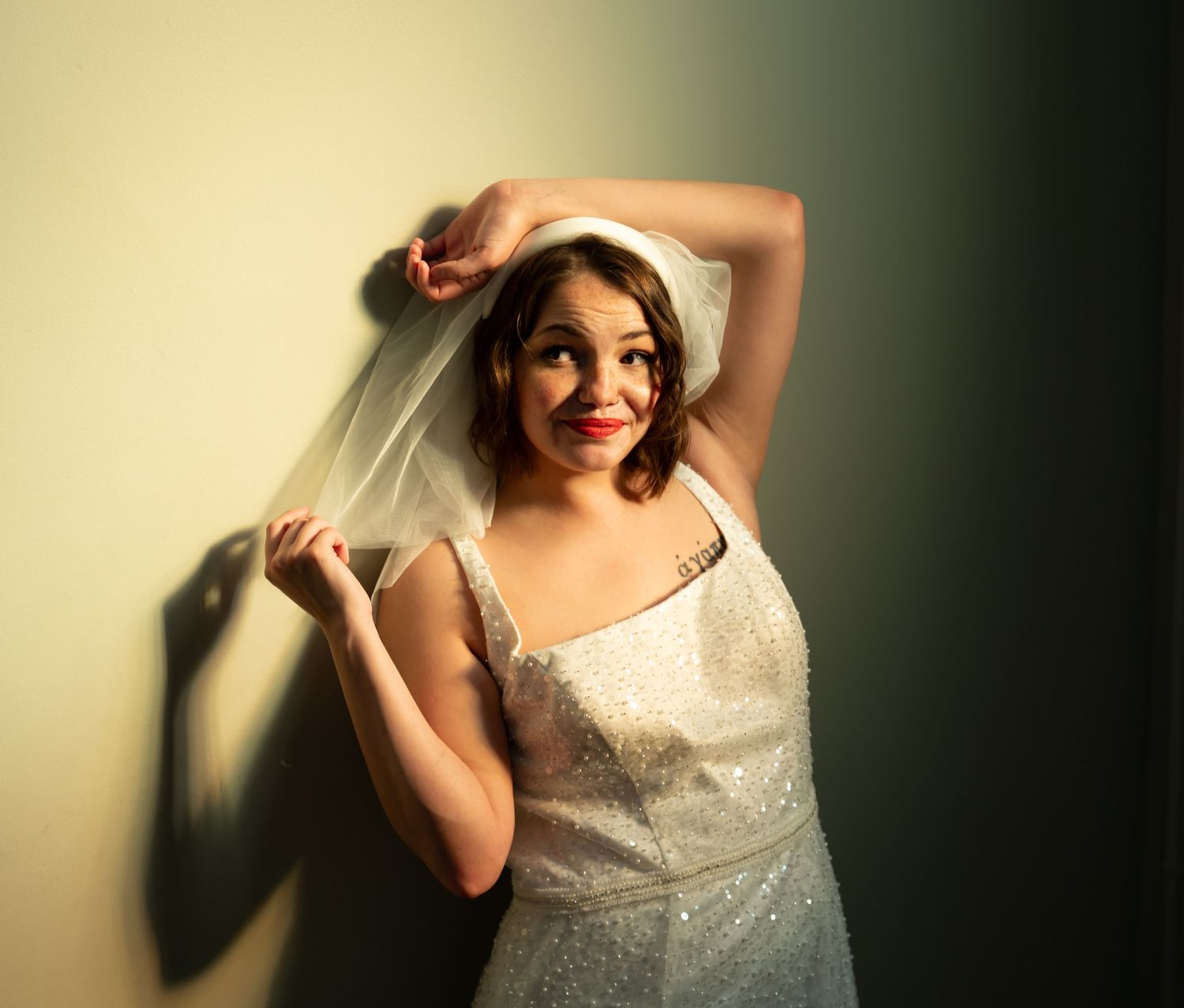 A dramatic series of vintage-style photos showing someone posing in a white dress in varying sepia-toned lighting effects.