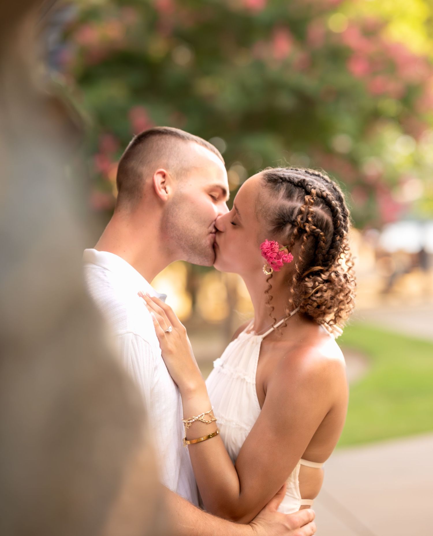 Tender moment between couple with soft focus and warm evening light down by the river in Columbus, Georgia.