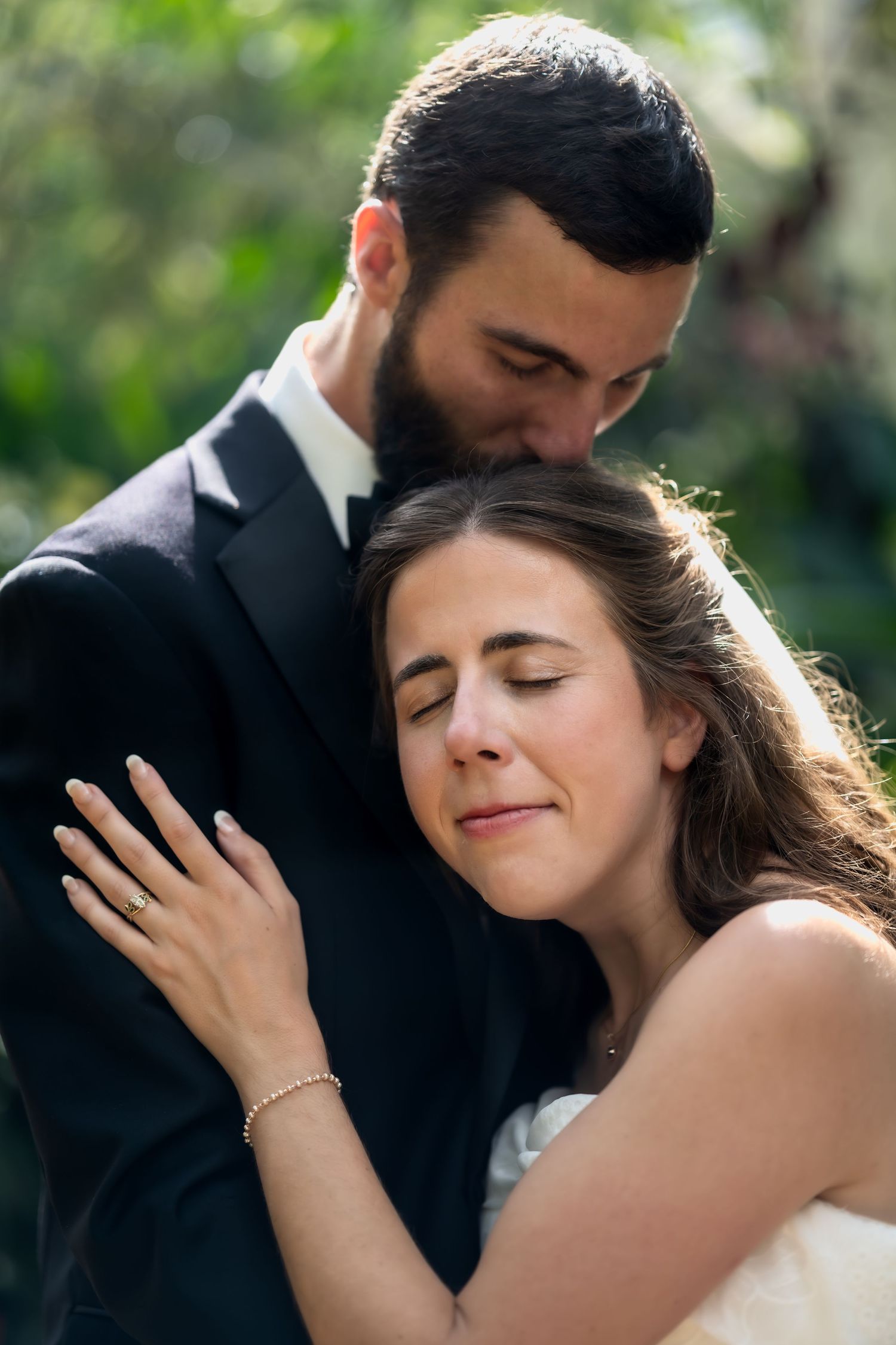 A romantic sequence of wedding photos showing tender moments between a bride and groom during their outdoor celebration.
