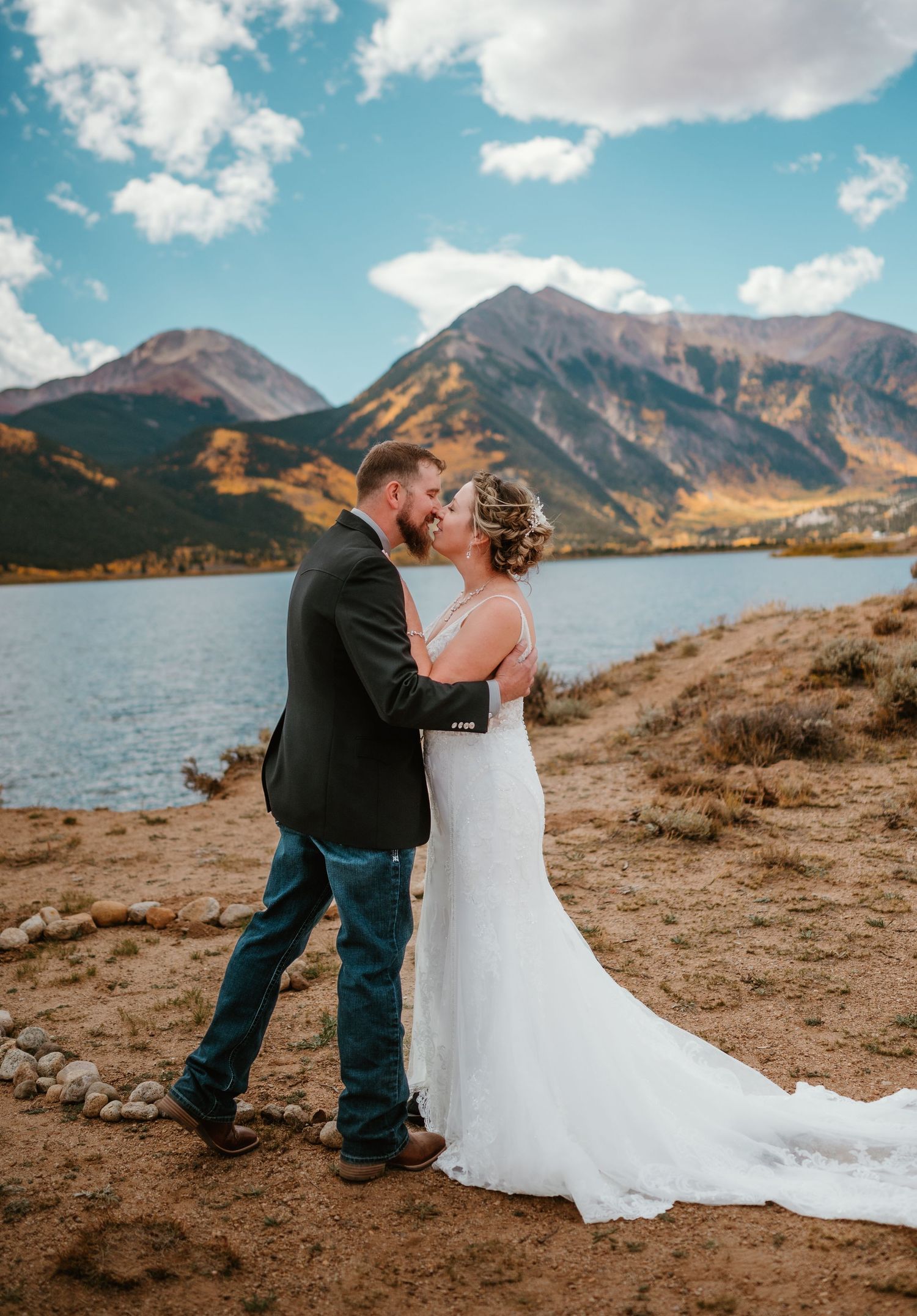A scenic mountain elopement photo sequence showing tender moments between newlyweds against Colorado's Twin Lakes landscape.