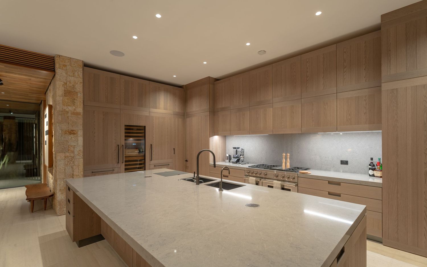 Contemporary luxury home in Los Cabos featuring minimalist design, natural stone, and desert landscaping