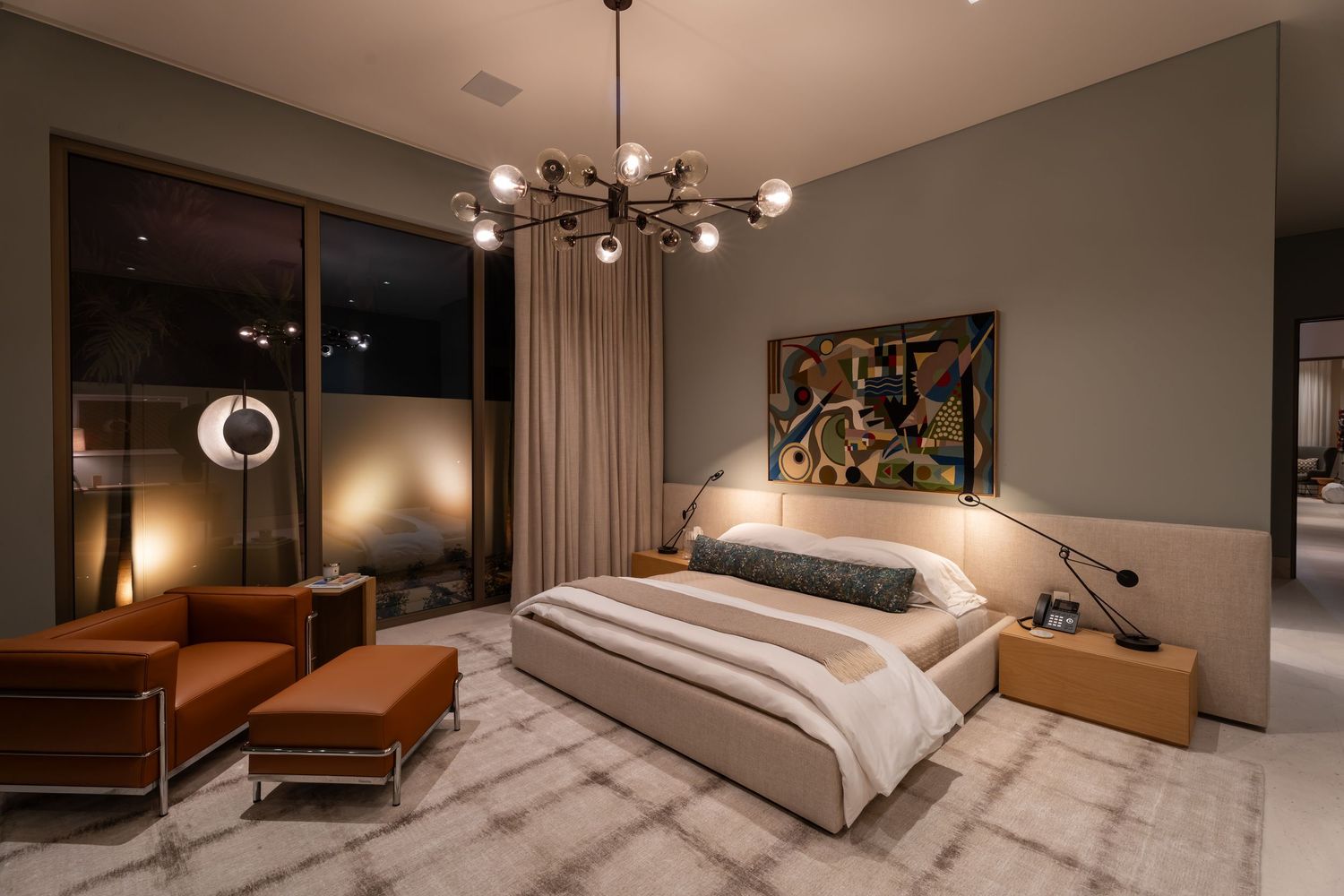 Contemporary luxury home in Los Cabos featuring minimalist design, natural stone, and desert landscaping