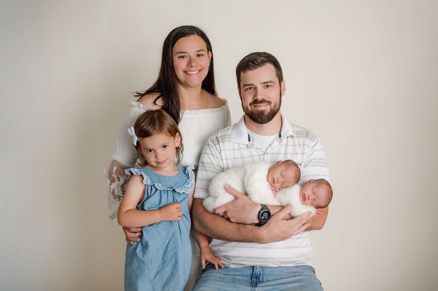 Newborn family session with mom, dad, daughter, and twin boys in studio. Krista Alyse Photography