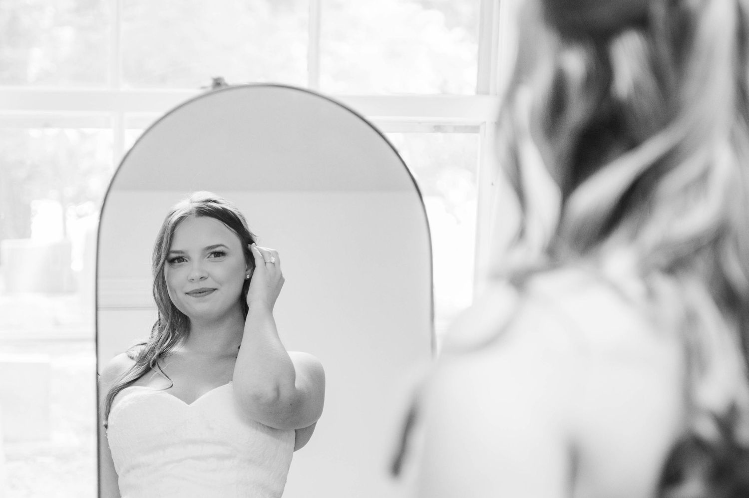 Black and white candid getting ready shots in soft focus.