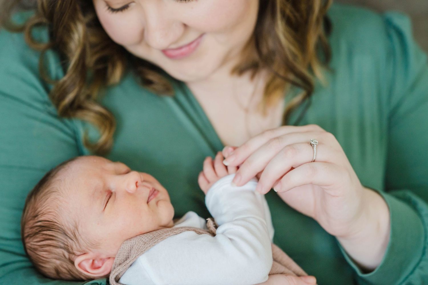 In-home newborn session with mom and baby