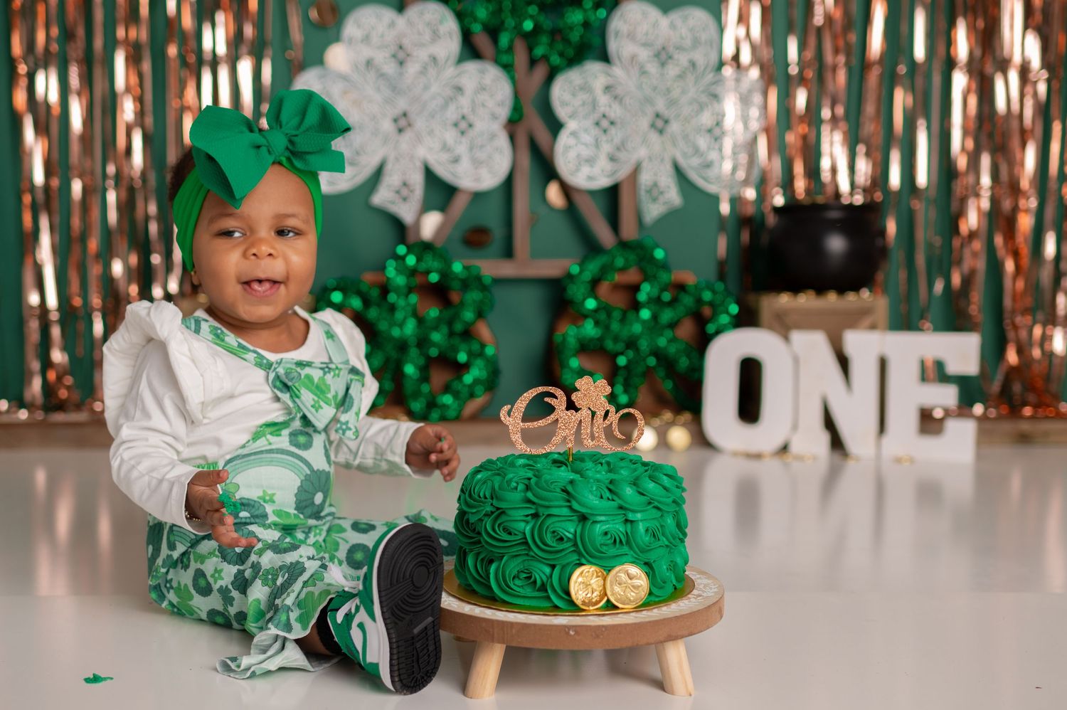 St. Patrick's Day celebration with green cake, shamrock decorations and festive party setup.