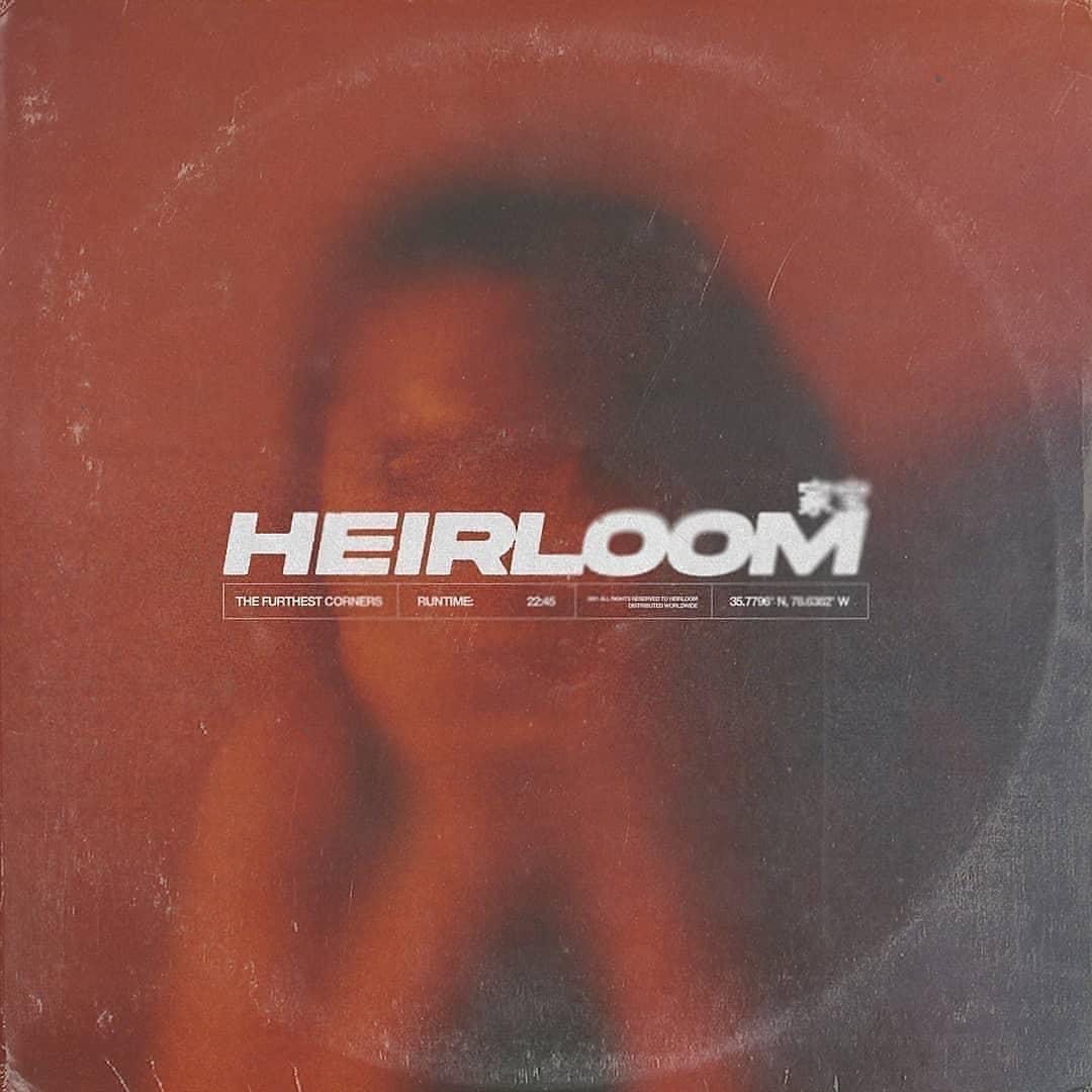 Album cover art with text 'HEIRLOOM' overlaid on a red-tinted portrait.