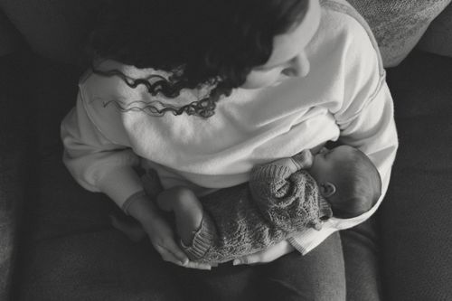 Winter in home newborn lifestyle session with mom and baby in Northern Indiana