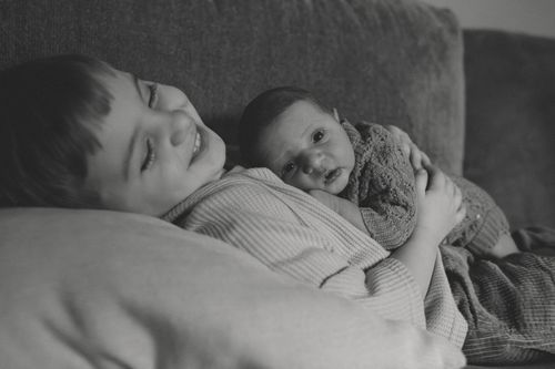 In home newborn lifestyle photography session in Northern Indiana