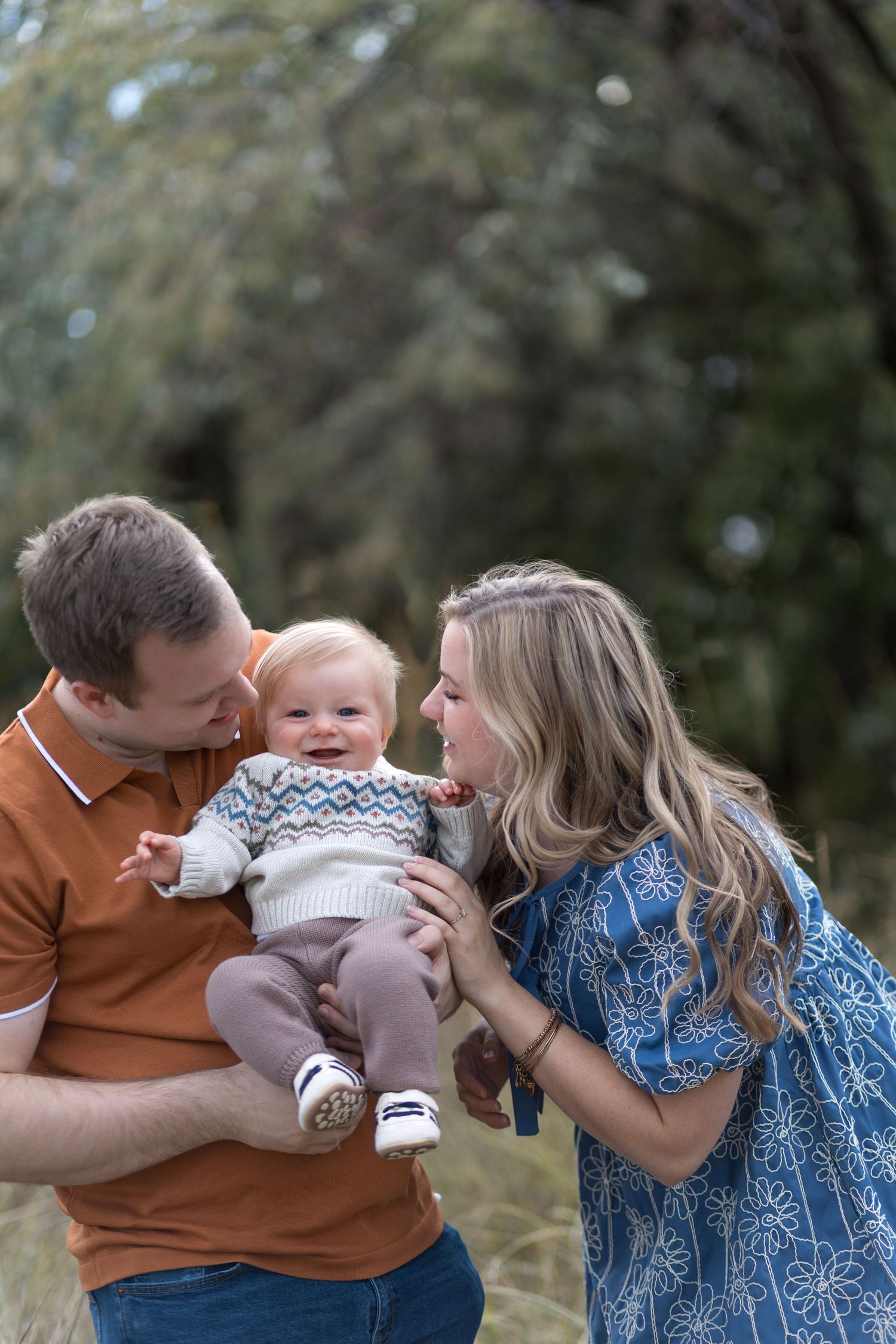 A family shares tender moments together outdoors in a series of candid photos showing love and connection.