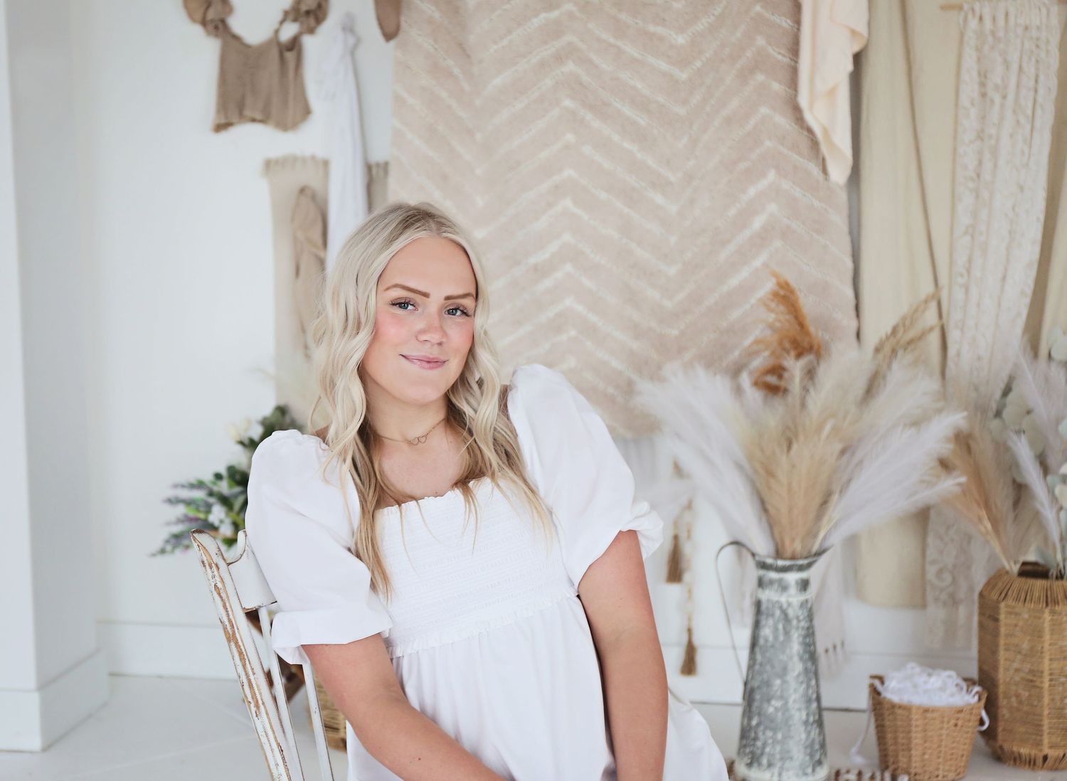White lace top and brown cowboy boots create a stylish contrast in this fashion photo series.