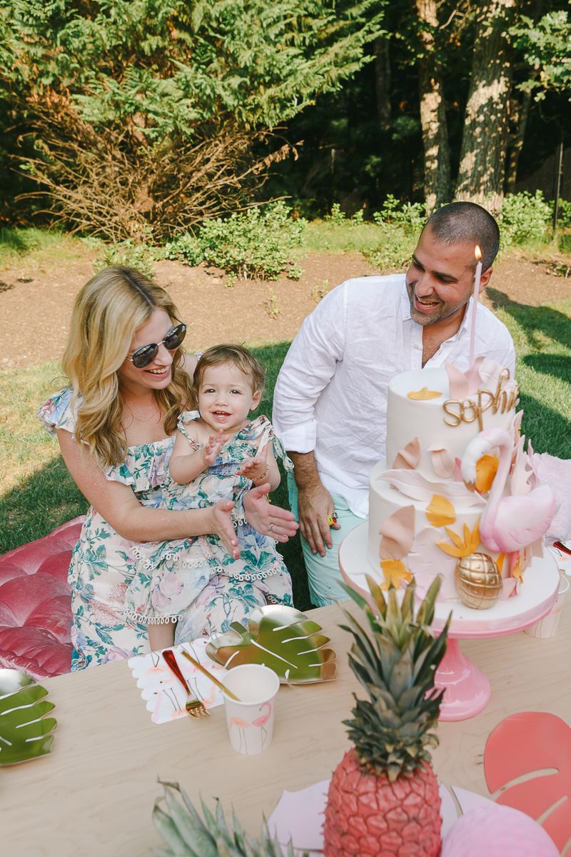 Hamptons birthday party moment singing happy birthday with couple and daughter, Paula Brearley NYC birthday party photographer