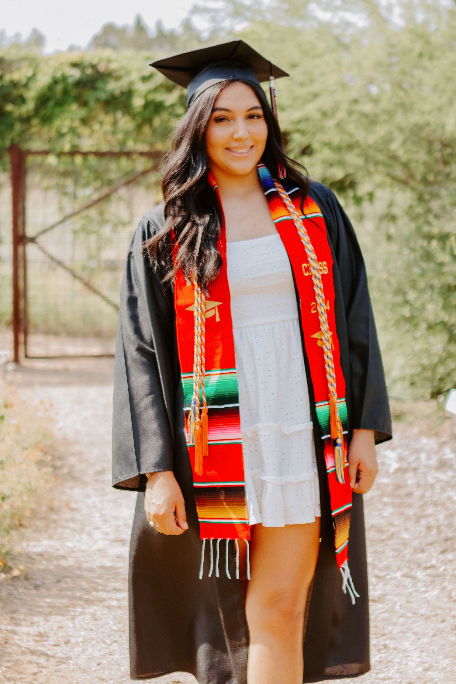 senior girl in cap and gown