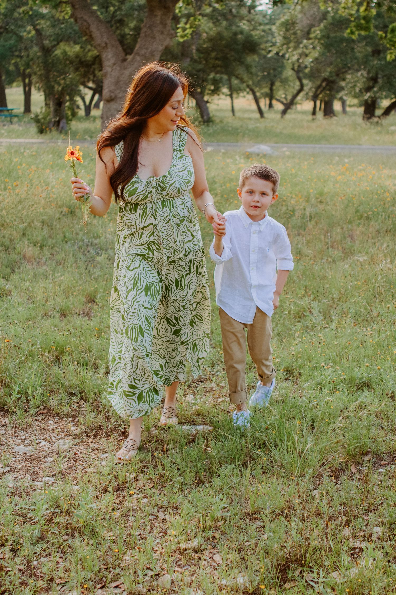 son and mom walking