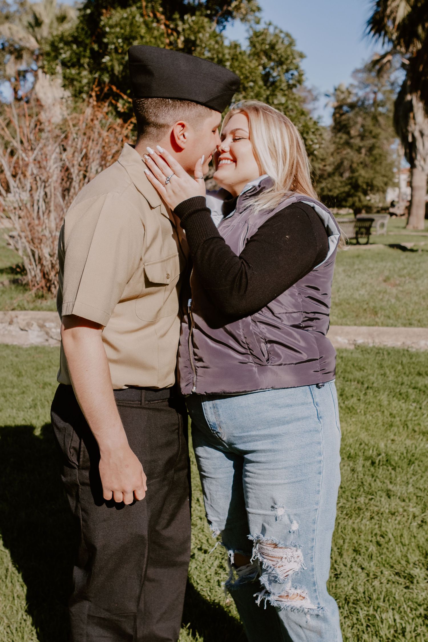 couple, leaning in and smiling