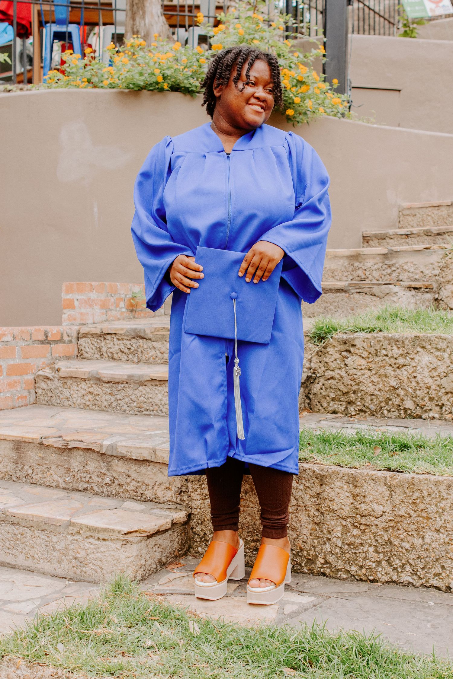 senior girl with cap and gown