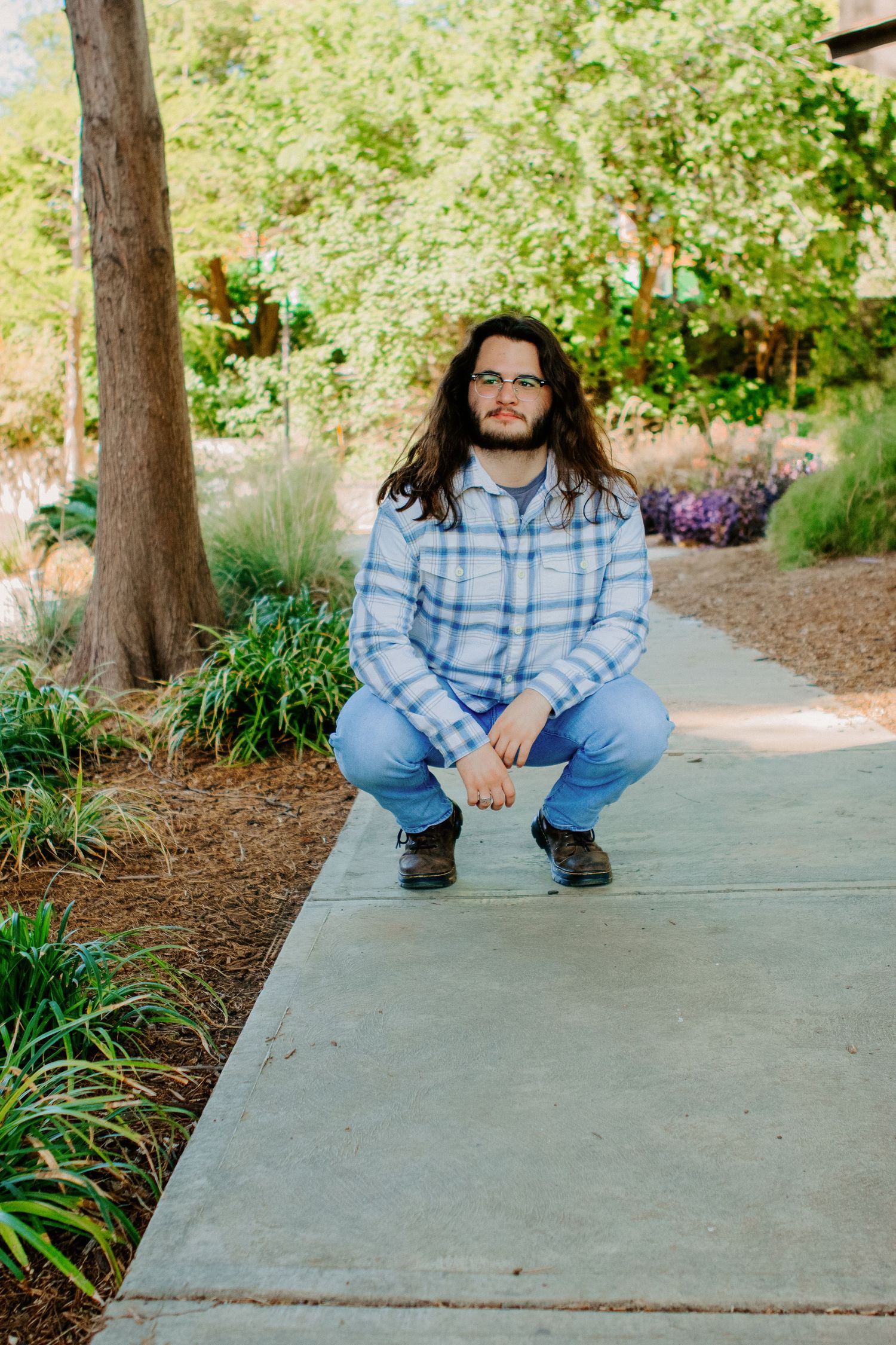 portrait of guy squatting