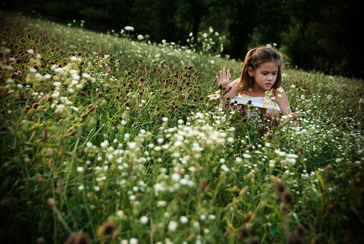 Young girl in field of flowers