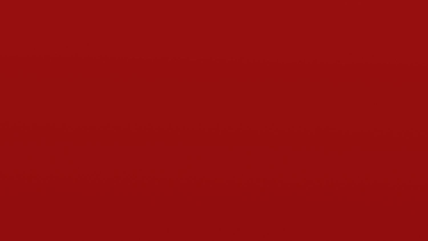 A solid red background texture with a rich crimson color fills the entire frame.
