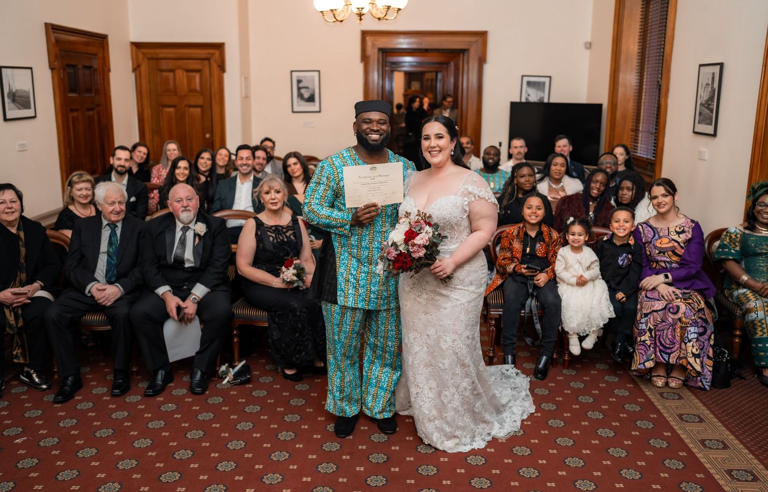 A panoramic sequence showing a wedding couple dancing in a traditional ballroom surrounded by guests.
