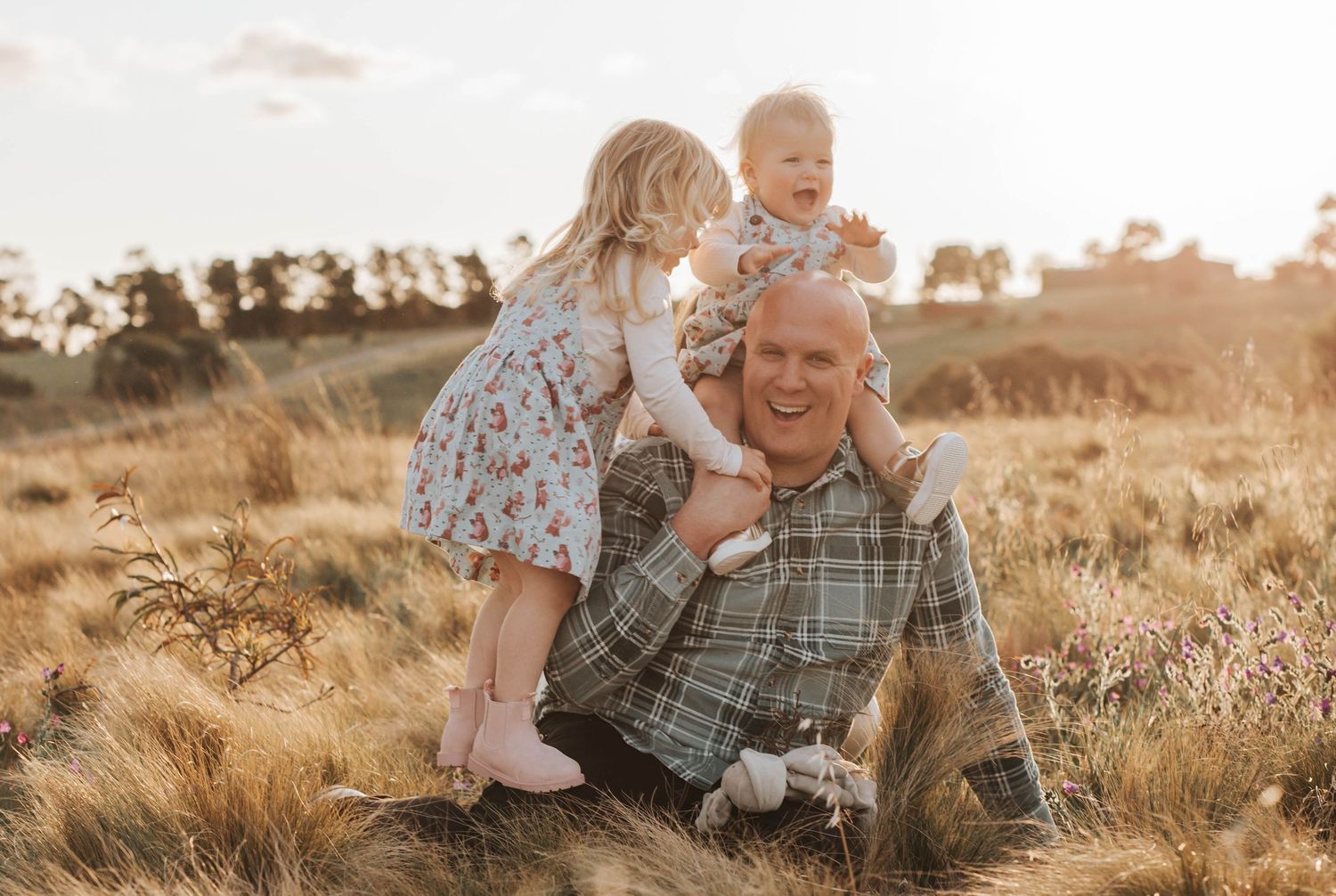 dad enjoying a moment with his kids