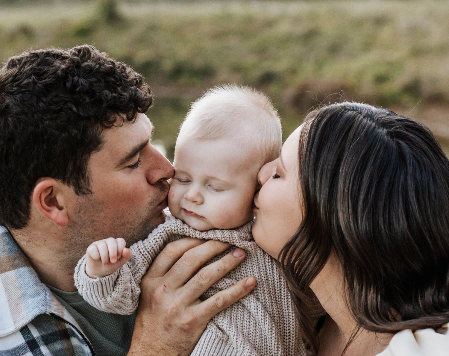 a kiss for their son