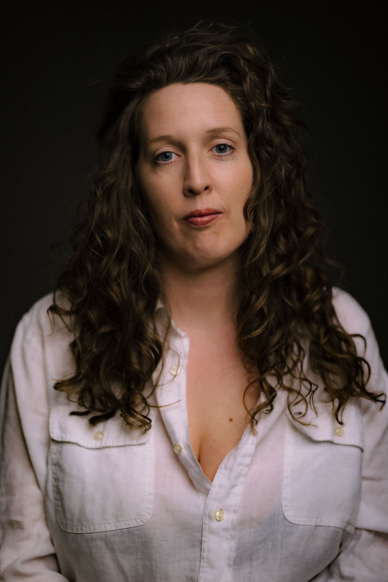 Editorial portrait photography capturing natural presence, intimacy, and connection.
