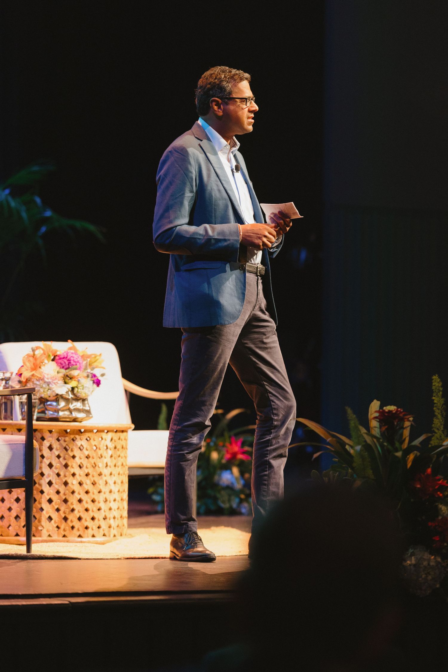 Event storytelling photography capturing a keynote speaker on stage during a Bay Area nonprofit fundraising event.